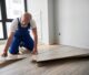 Man installing floor