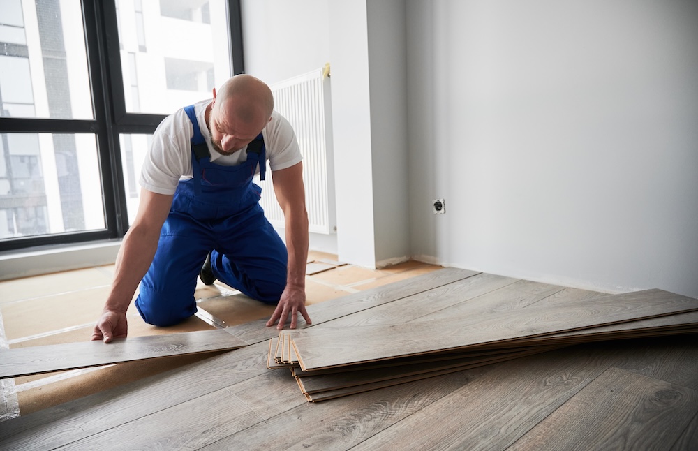 Man installing floor